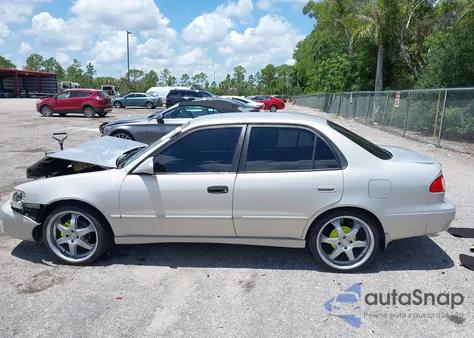 2001 Toyota Corolla S z USA, uszkodzony, nr VIN 2T1BR12E51C494473